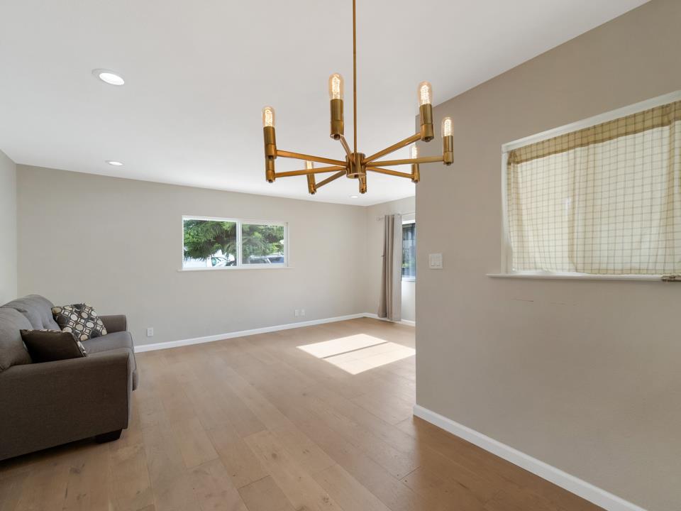 22824 High Street Hayward, CA 94541 - Photo 6 of 23 a living room with furniture and a window