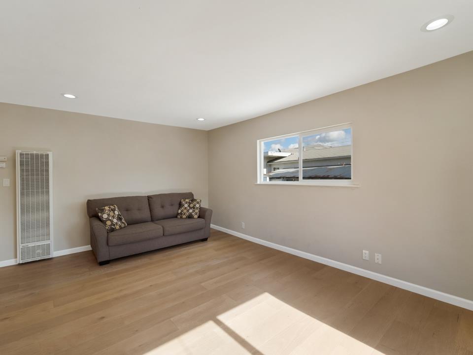 22824 High Street Hayward, CA 94541 - Photo 7 of 23 a living room with furniture and a window