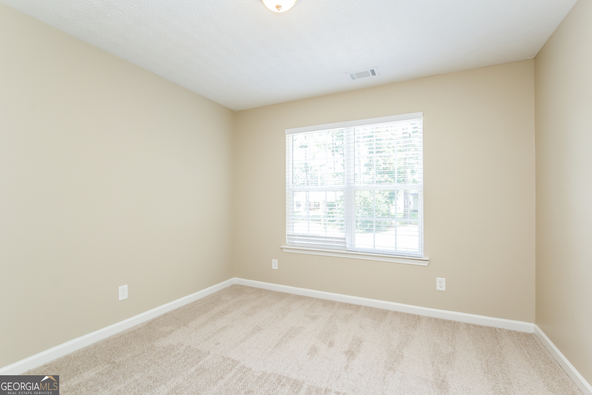 308 Barr Circle Rex, GA 30273 - Photo 13 of 15 an empty room with a window