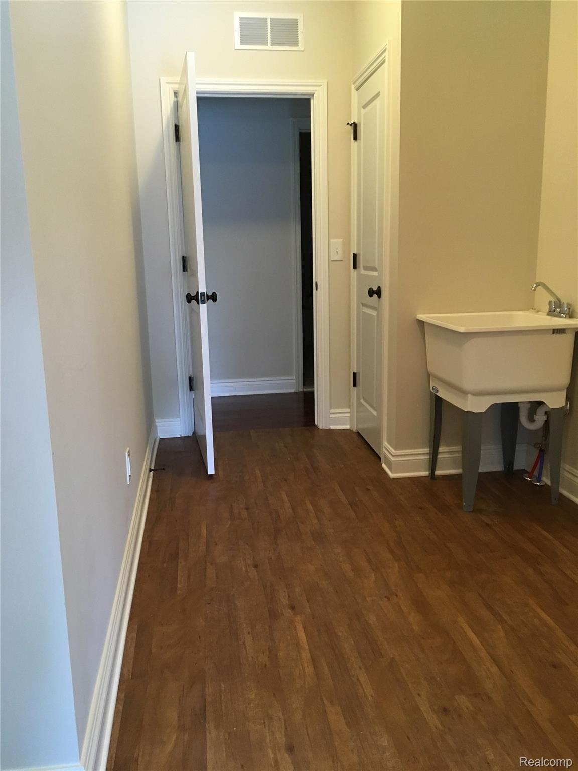 4052 Cameron Court Wixom, MI 48393 - Photo 22 of 28 Laundry Room