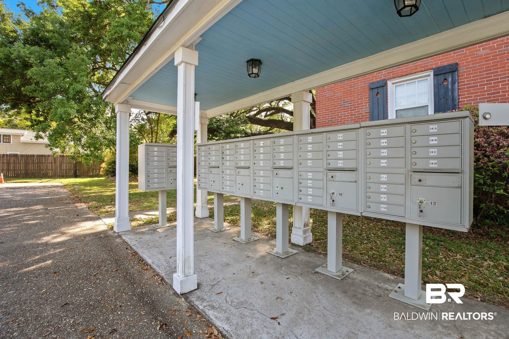 214 Upham Street, Unit 8D Mobile, AL 36607 - Photo 35 of 36 View of home's community featuring mail area and a patio area