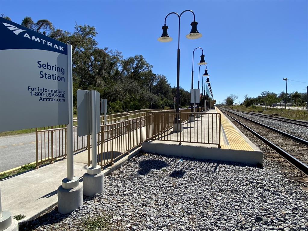 3050 Desoto City Road Sebring, FL 33870 - Photo 8 of 15 a view of a balcony with a car parked on the road