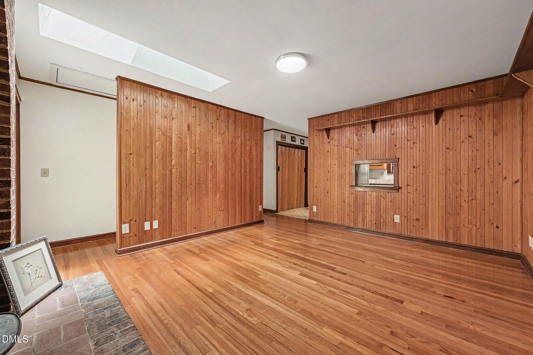 200 Spring Valley Road Carrboro, NC 27510 - Photo 13 of 38 a view of an empty room with wooden floor