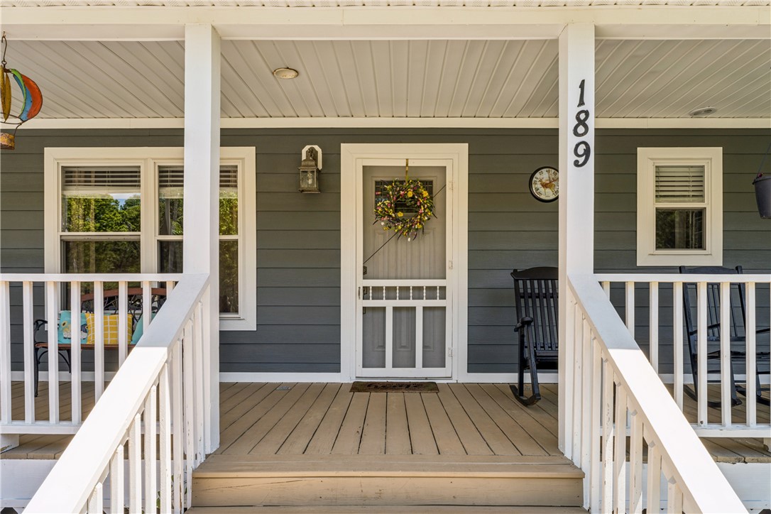 189 Little Choestoea Road Westminster, SC 29693 - Photo 34 of 38 This charming front porch welcomes you with classic style and ample space for relaxation.