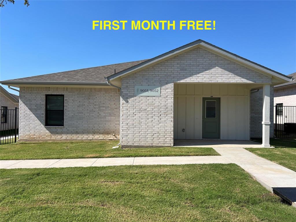 3050 Viking Street Denison, TX 75020 - Photo 1 of 17 a view of a house with a small yard