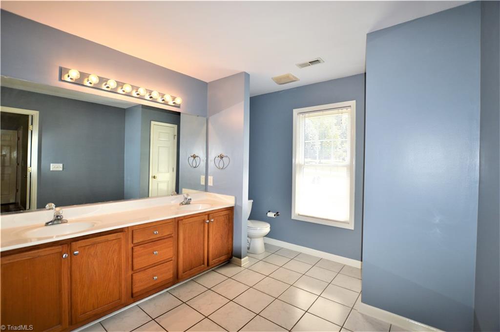 168 Running Cedar Road Madison, NC 27025 - Photo 13 of 30 Large master bathroom with dual sinks