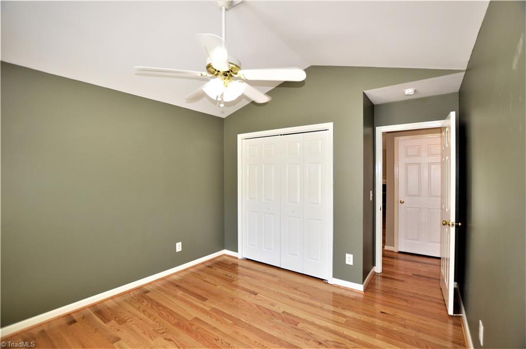 168 Running Cedar Road Madison, NC 27025 - Photo 17 of 30 2nd bedroom with vaulted ceiling