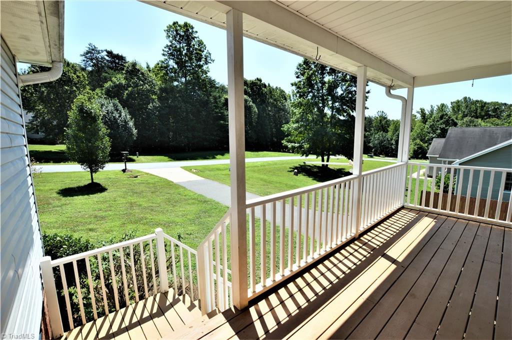 168 Running Cedar Road Madison, NC 27025 - Photo 25 of 30 Covered front porch overlooking lovely front yard