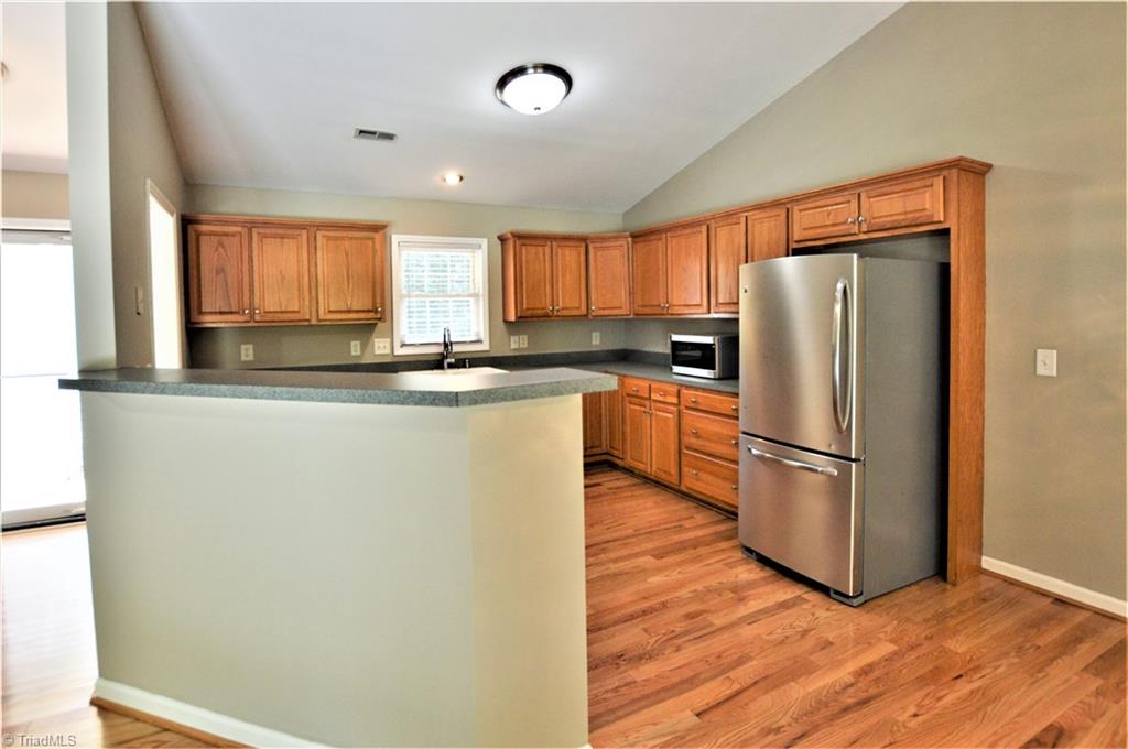 168 Running Cedar Road Madison, NC 27025 - Photo 5 of 30 View of kitchen from dining area