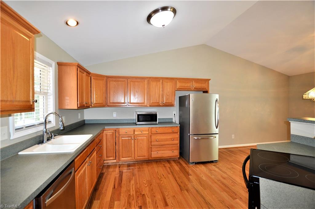 168 Running Cedar Road Madison, NC 27025 - Photo 8 of 30 View of kitchen from entry
