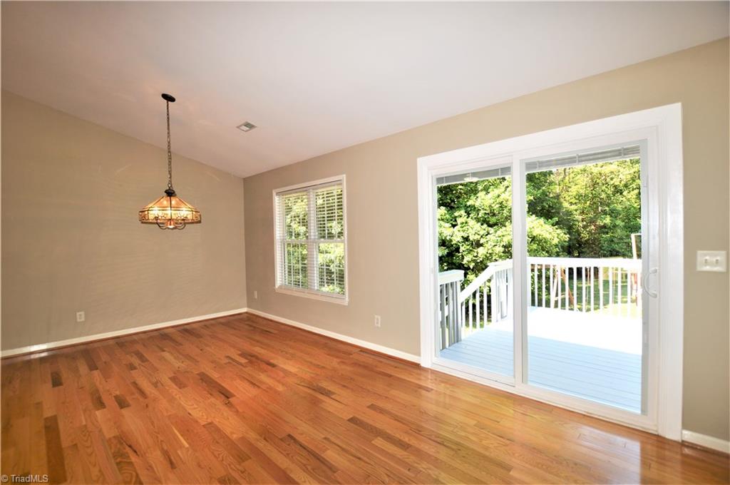 168 Running Cedar Road Madison, NC 27025 - Photo 10 of 30 Dining area with doors to deck