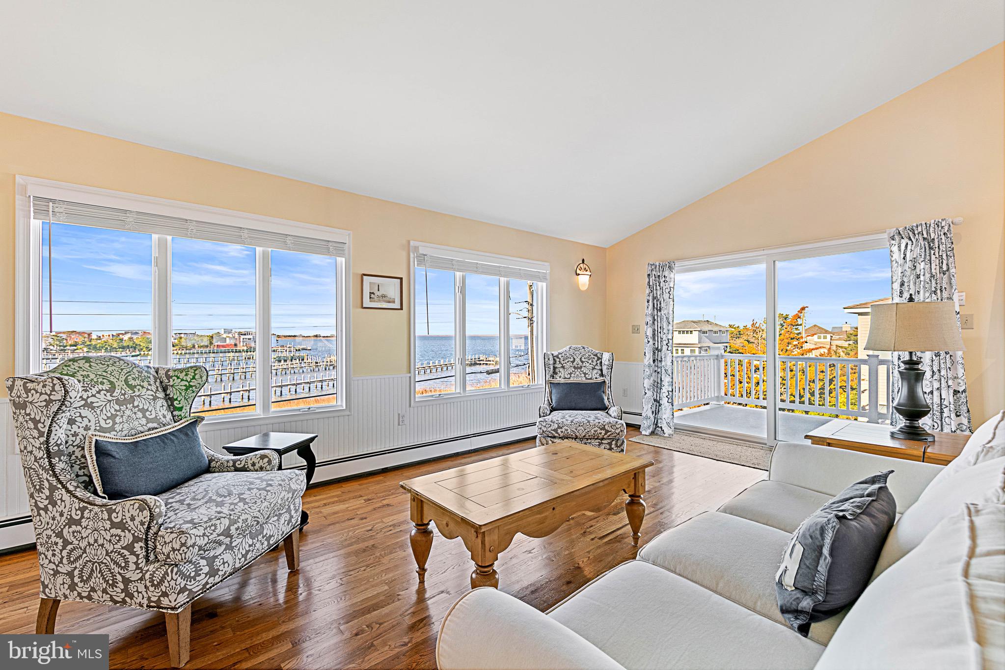 19 Cedar Drive Long Beach Township, NJ 08008 - Photo 15 of 69 Hardwood flooring and lots of glass.
