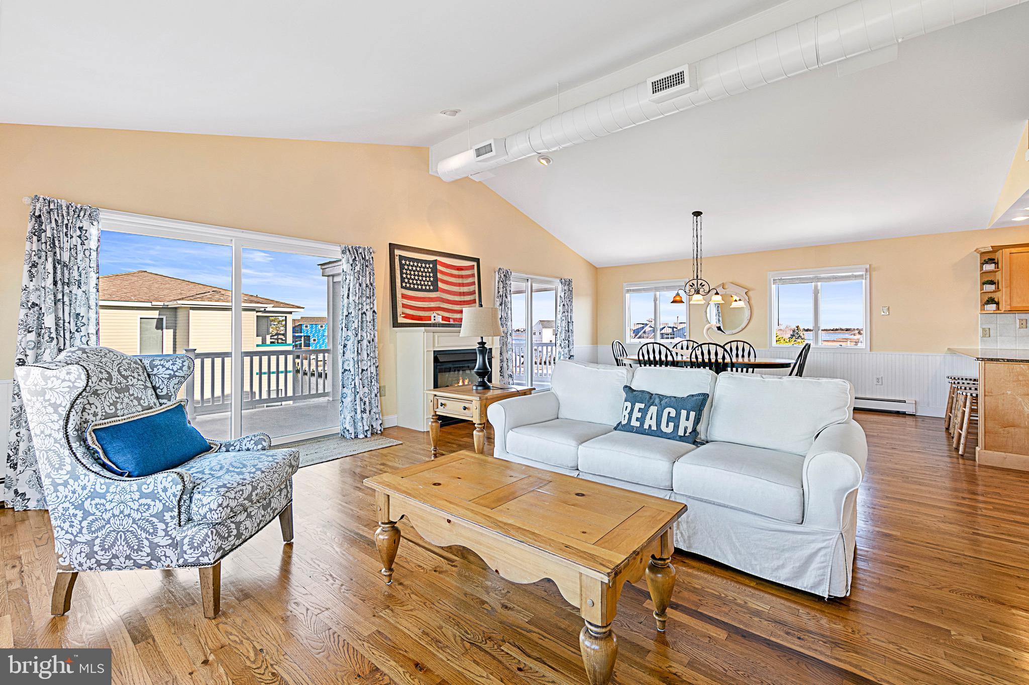 19 Cedar Drive Long Beach Township, NJ 08008 - Photo 16 of 69 Great room with sliders and fire place.