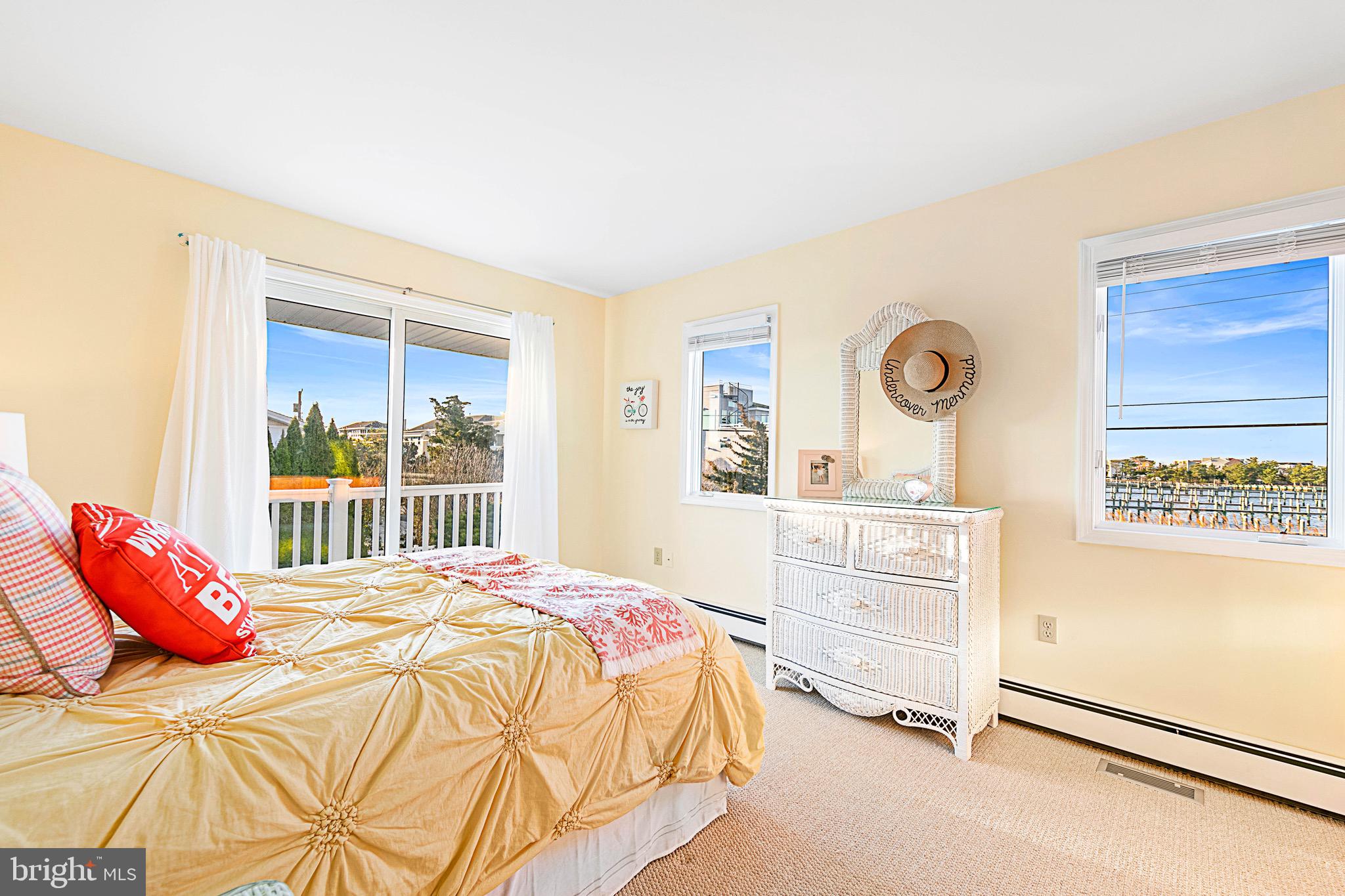 19 Cedar Drive Long Beach Township, NJ 08008 - Photo 38 of 69 Bayfront guest room with private deck.