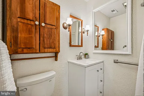 a view of a room with wooden walls