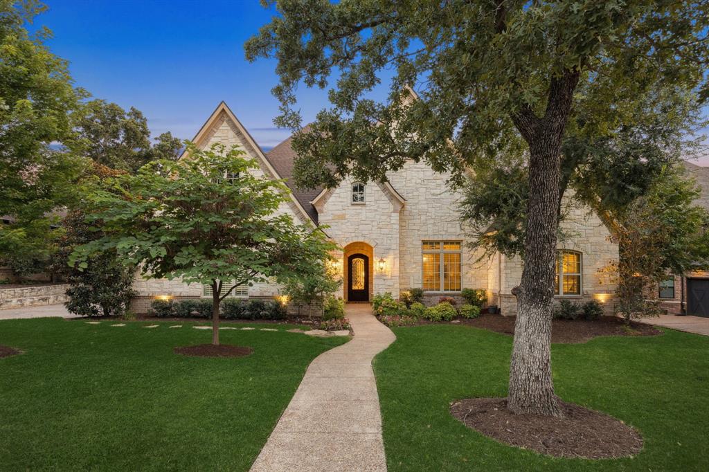 6 Stephen's Court Trophy Club, TX 76262 - Photo 1 of 1 a front view of a house with garden
