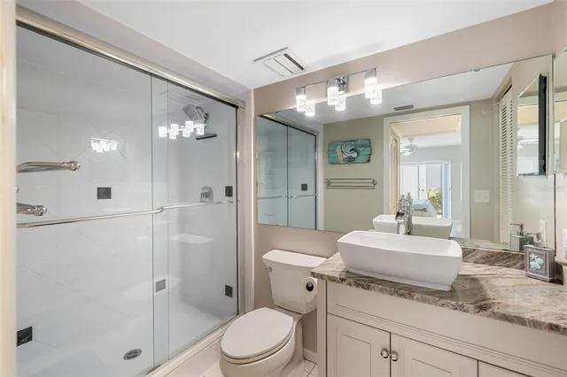 a bedroom with a bed and furniture