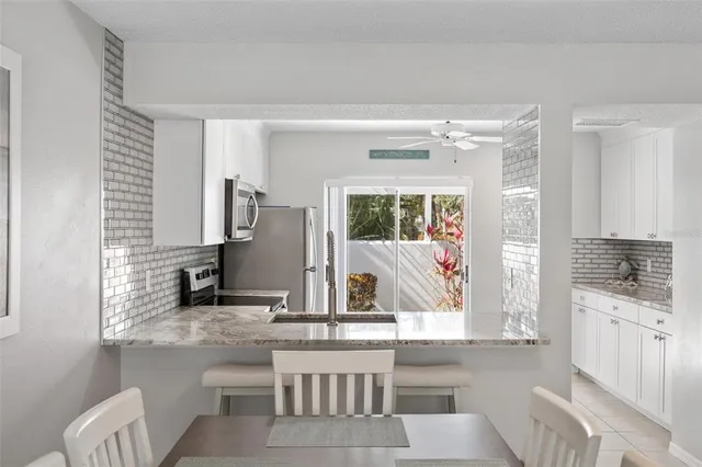 a view of a dining room with furniture