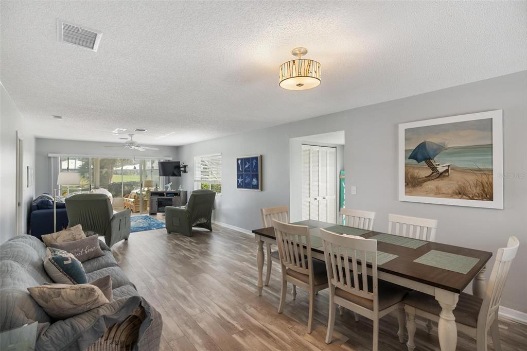 276 Cerromar Way South, Unit 60 Venice, FL 34293 - Photo 9 of 31 a view of a dining room with furniture