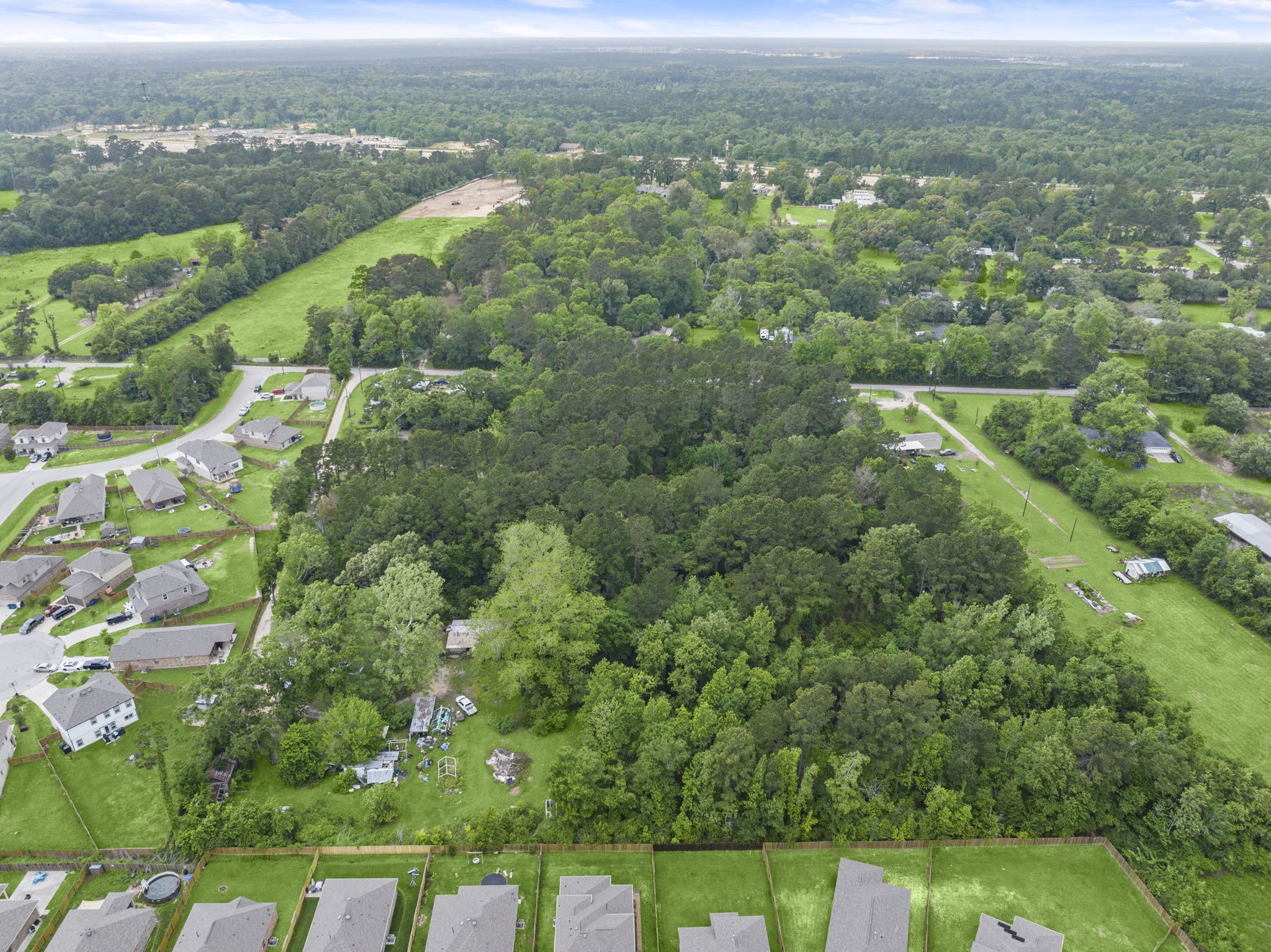15399 Memorial Drive Splendora, TX 77372 - Photo 11 of 15 an aerial view of a houses with a yard