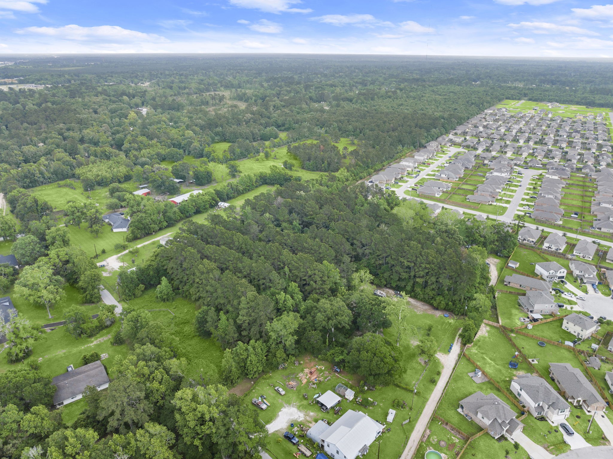 15399 Memorial Drive Splendora, TX 77372 - Photo 7 of 15 a view of a city