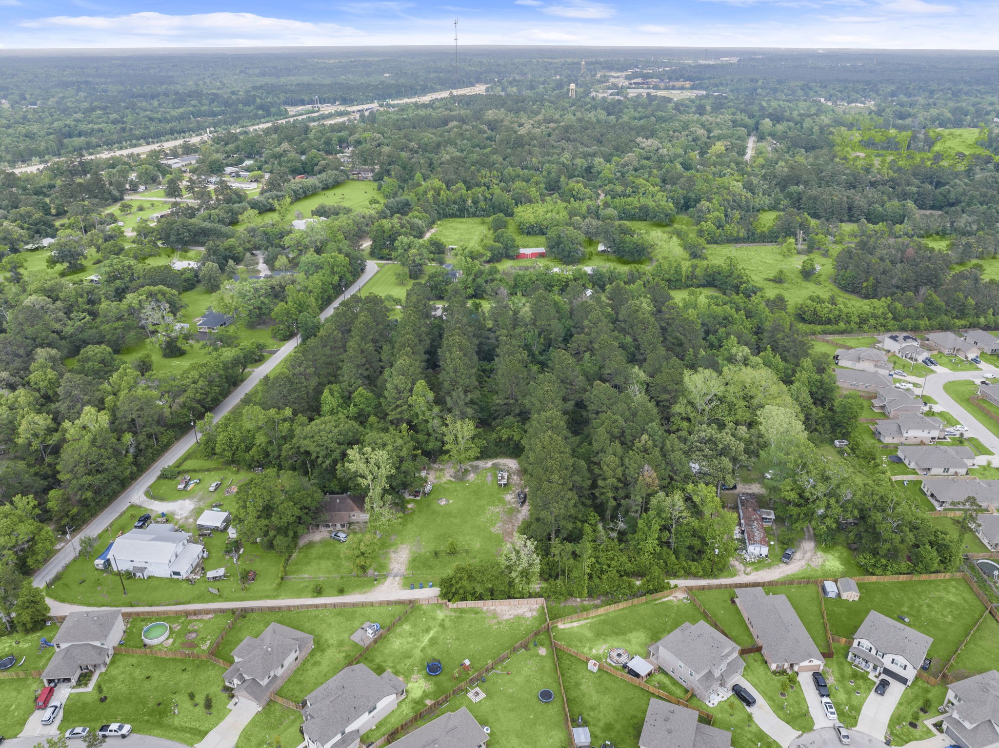 15399 Memorial Drive Splendora, TX 77372 - Photo 9 of 15 a view of a city
