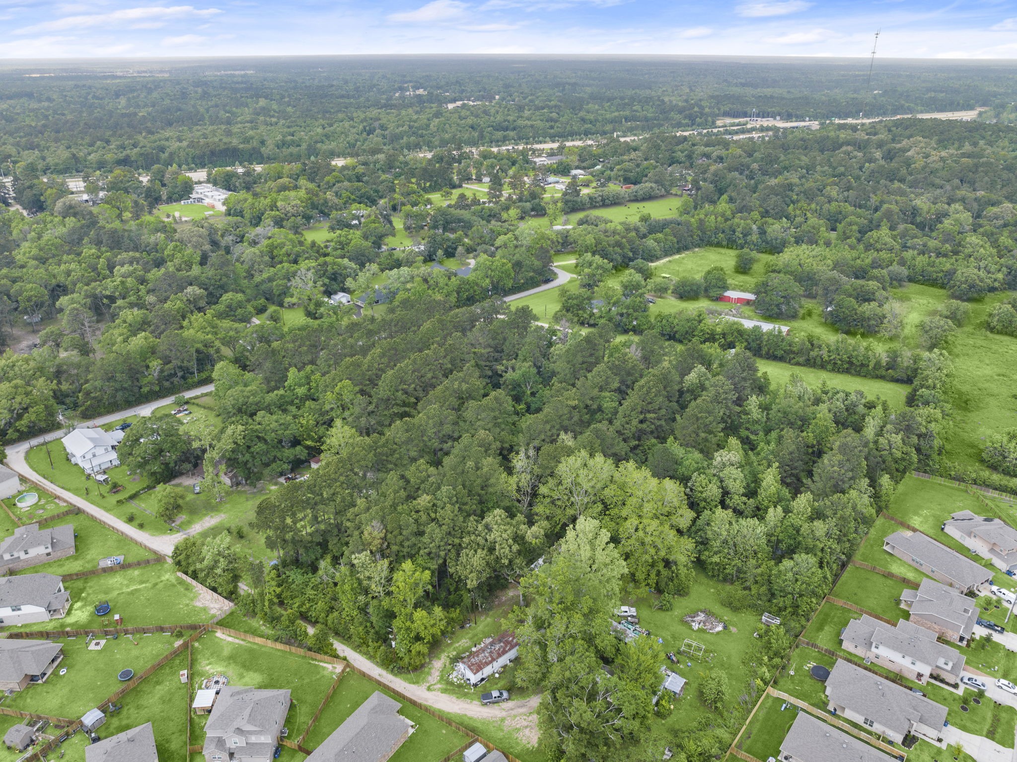 15399 Memorial Drive Splendora, TX 77372 - Photo 10 of 15 a view of a city from a balcony