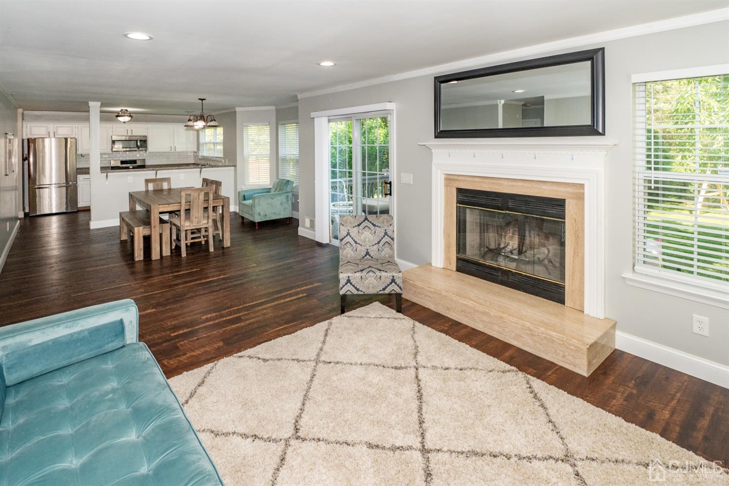 42 Springfield Road North Brunswick, NJ 08902 - Photo 13 of 37 a living room with furniture and a fireplace