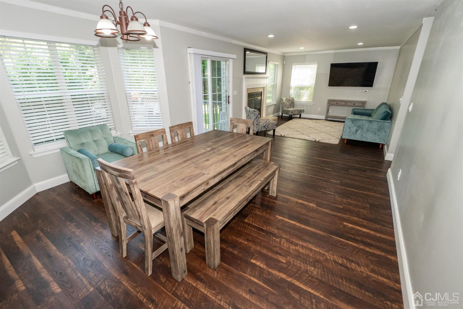 42 Springfield Road North Brunswick, NJ 08902 - Photo 15 of 37 a living room with dining room and wooden floor