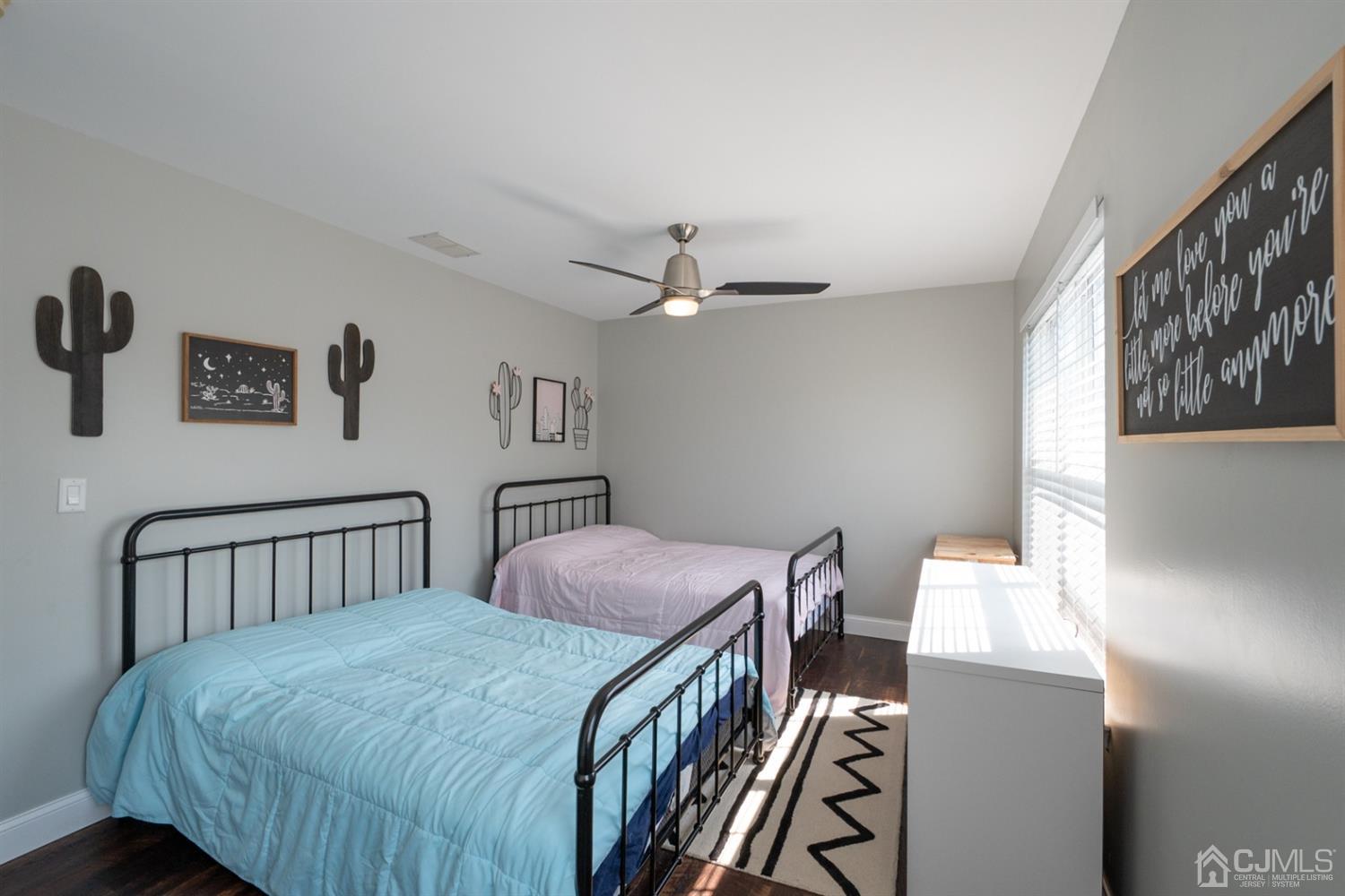 42 Springfield Road North Brunswick, NJ 08902 - Photo 20 of 37 a bedroom with two beds and a dresser