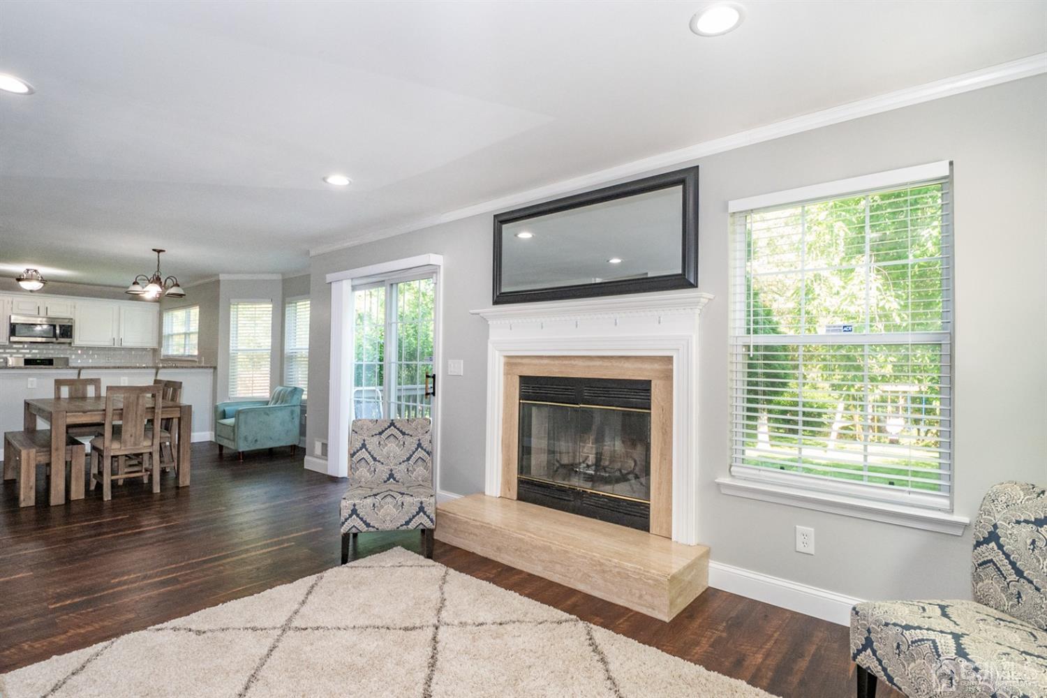 42 Springfield Road North Brunswick, NJ 08902 - Photo 3 of 37 a living room with furniture and a fireplace