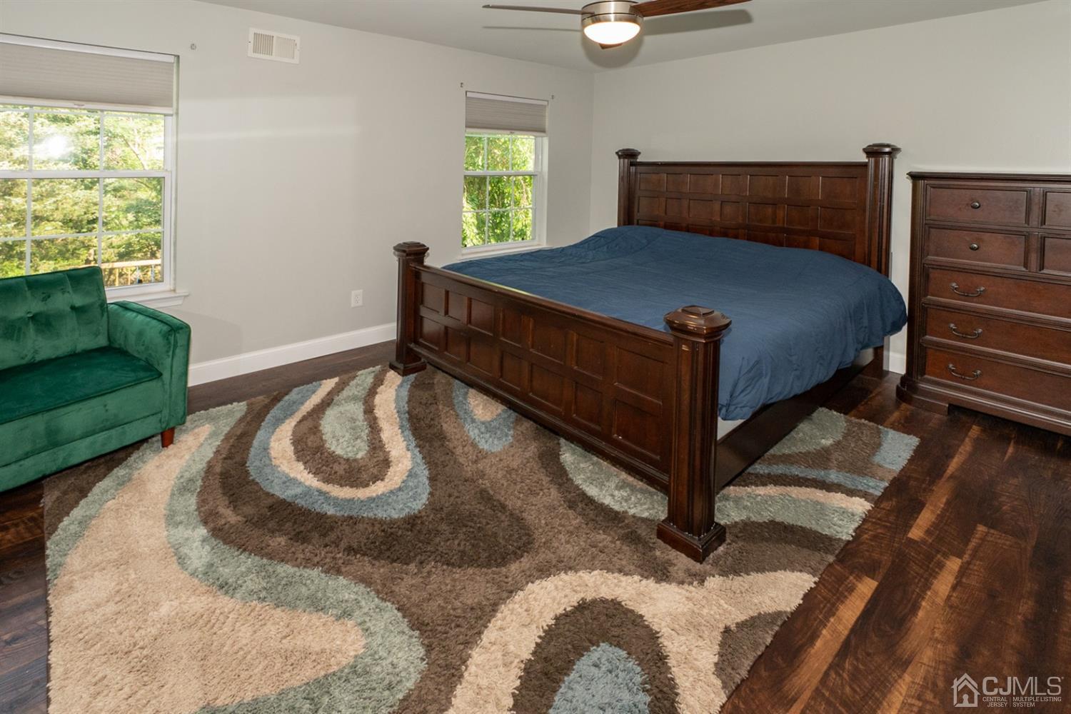 42 Springfield Road North Brunswick, NJ 08902 - Photo 24 of 37 a bed sitting in a bedroom next to a window