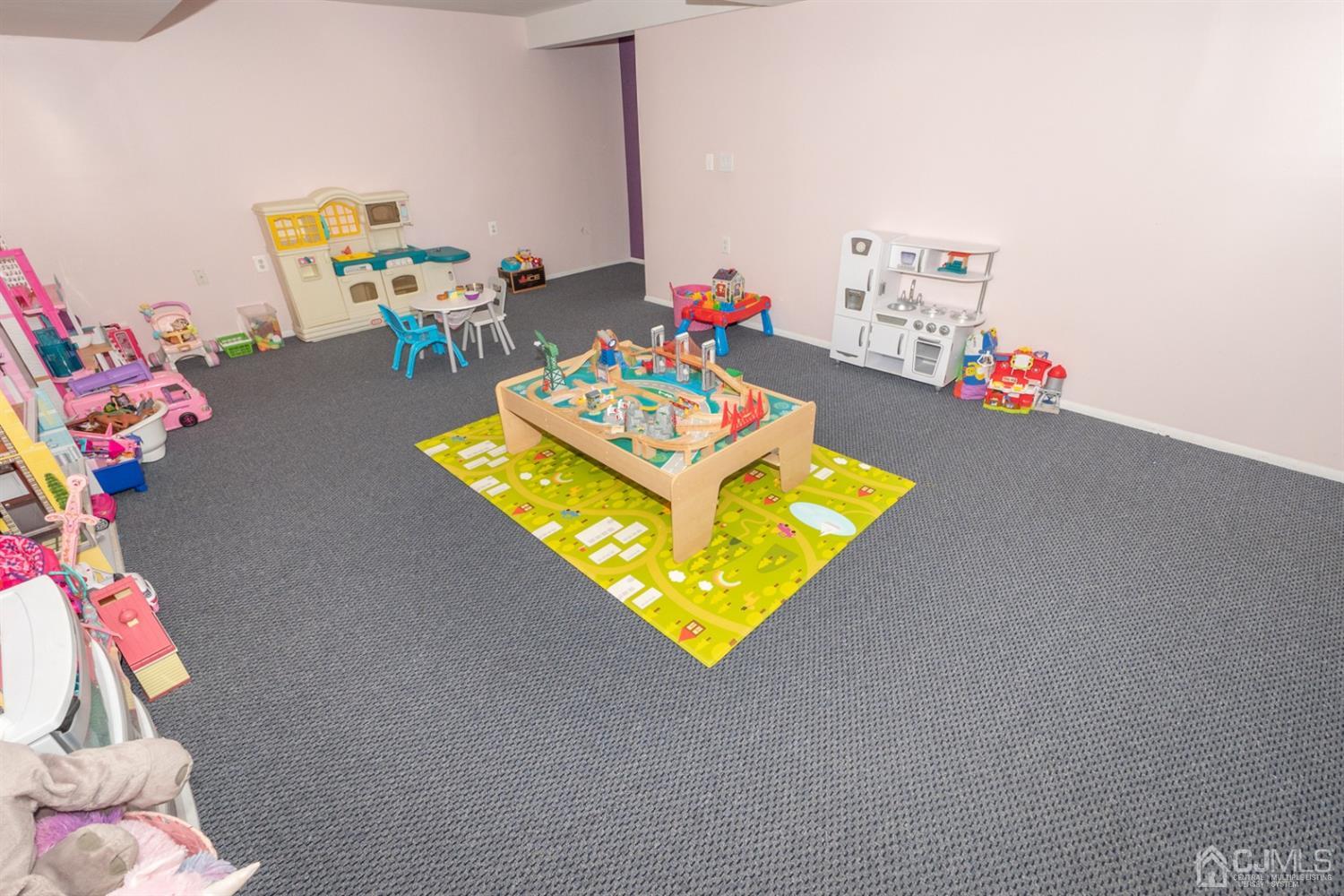 42 Springfield Road North Brunswick, NJ 08902 - Photo 30 of 37 a living room with furniture and a table