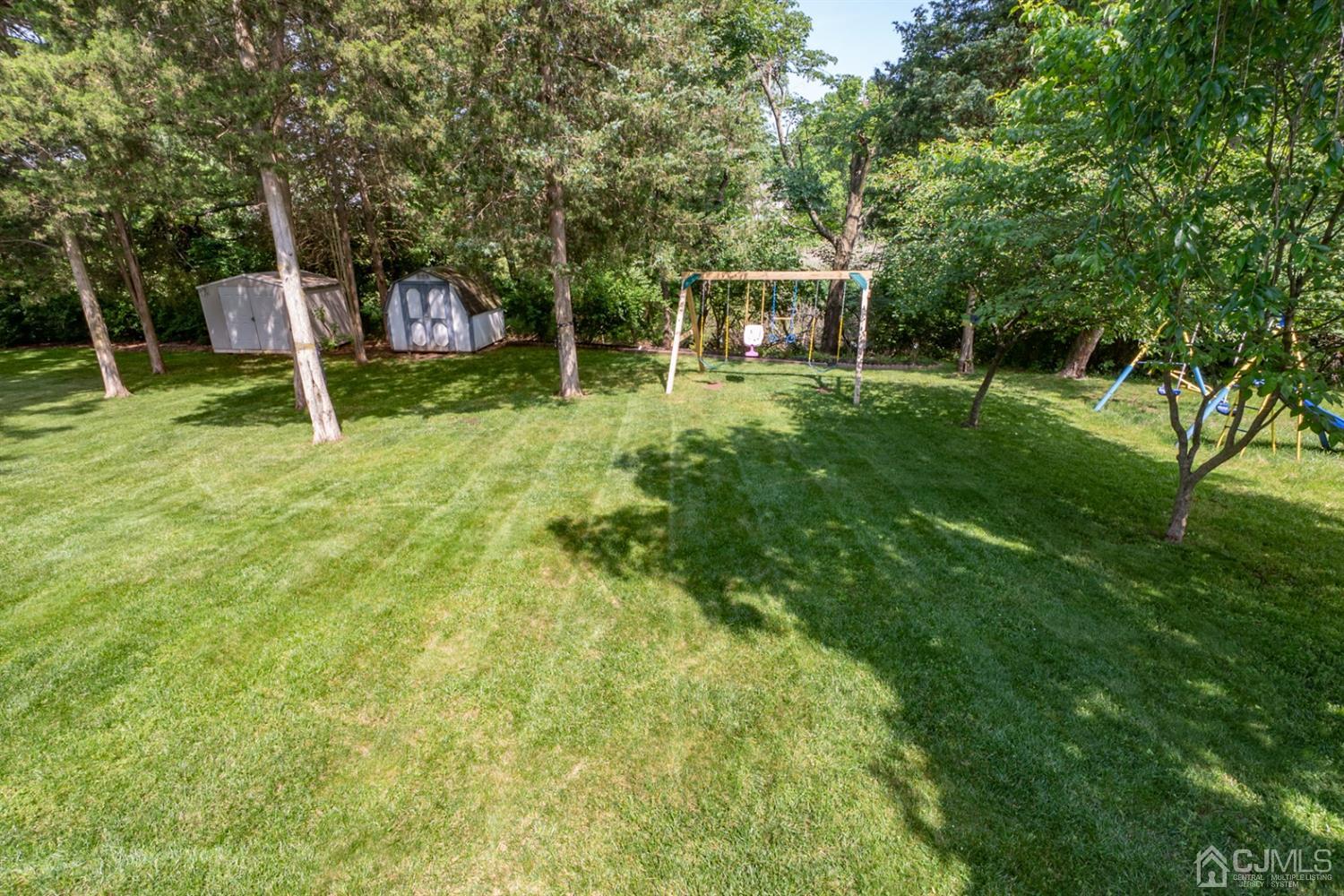 42 Springfield Road North Brunswick, NJ 08902 - Photo 35 of 37 a view of a house with backyard and a sitting area