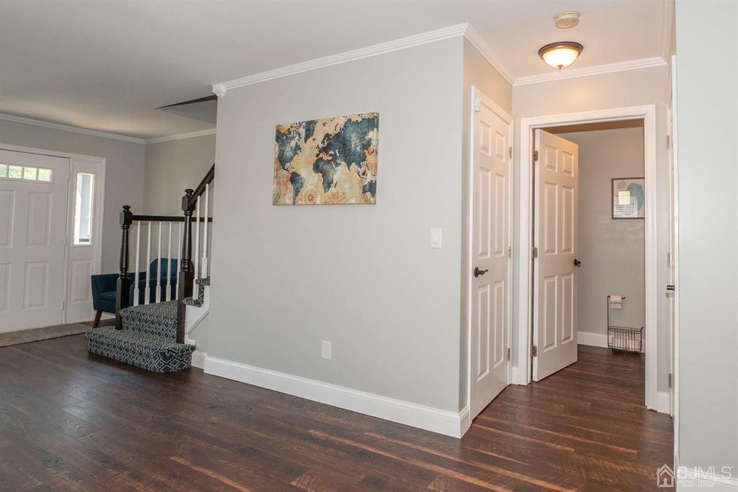 42 Springfield Road North Brunswick, NJ 08902 - Photo 8 of 37 a view of entryway with wooden floor