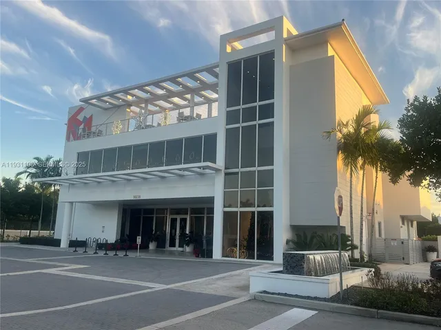 a view of a balcony with chairs