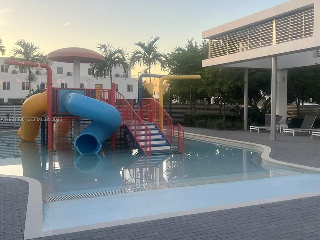 a view of a golf course with a lake