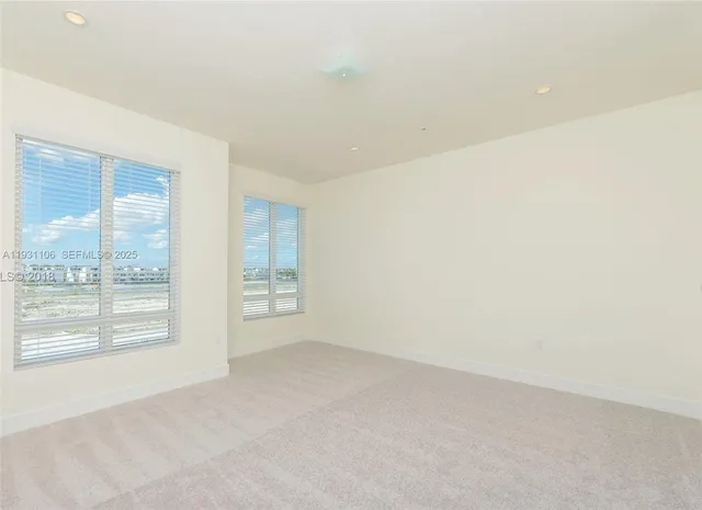 a bathroom with a double vanity sink and mirror