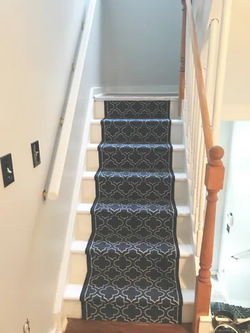 a view of entryway with a front door