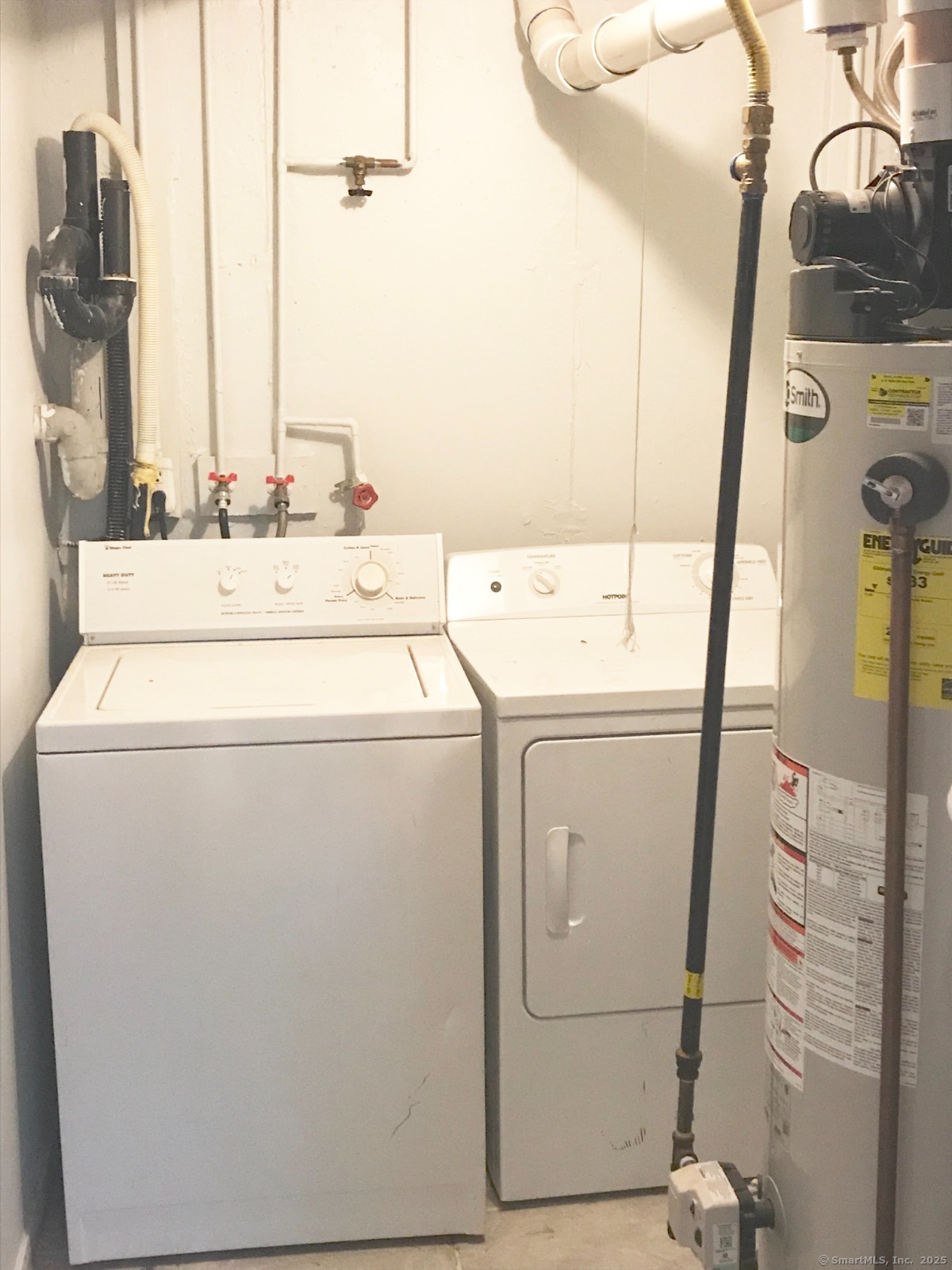 140 Shepard Avenue, Unit 140 Hamden, CT 06514 - Photo 29 of 29 a utility room with dryer and washer