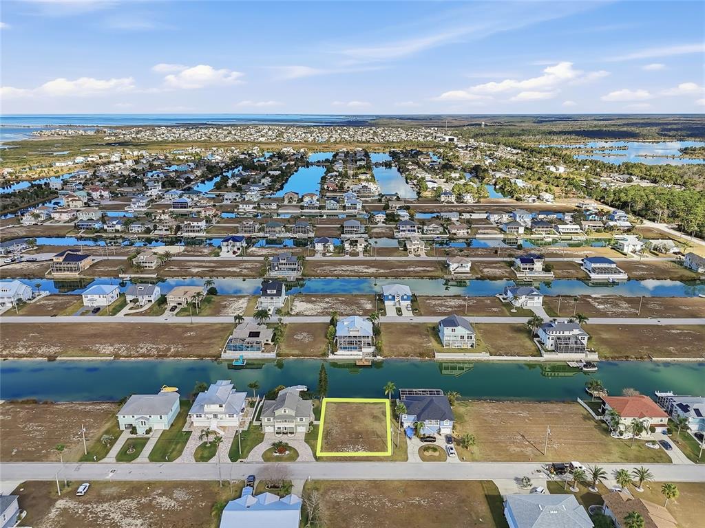 Undisclosed Address Hernando Beach, FL 34607 - Photo 6 of 14 an aerial view of a city