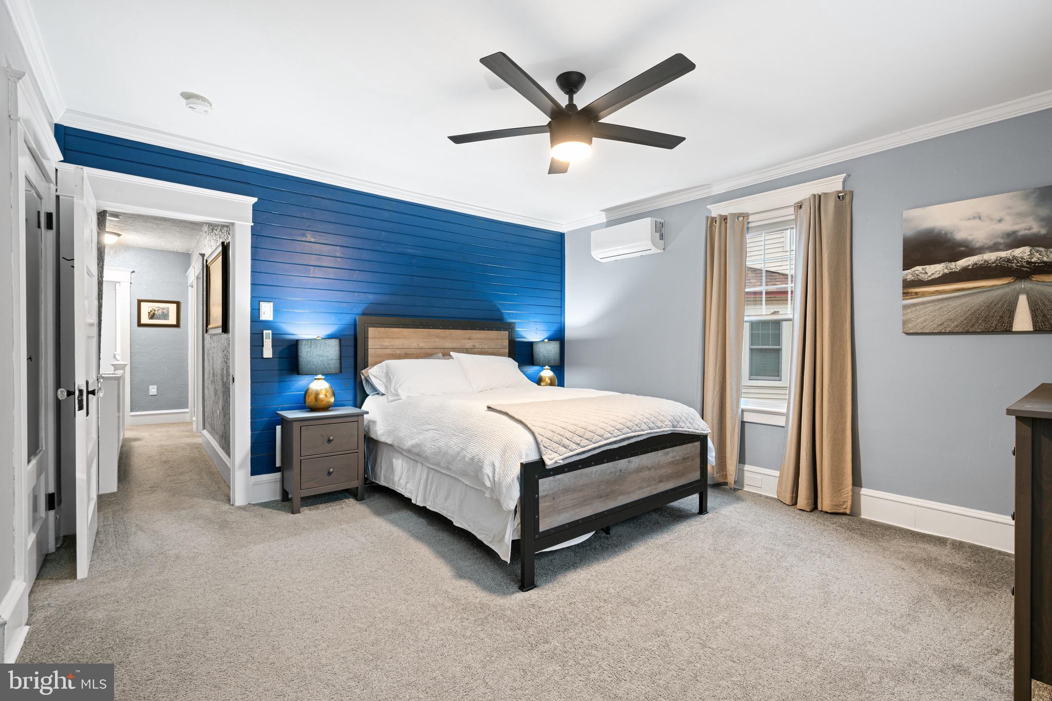 227 7th Avenue Haddon Heights, NJ 08035 - Photo 12 of 26 a bedroom with a bed next to a window