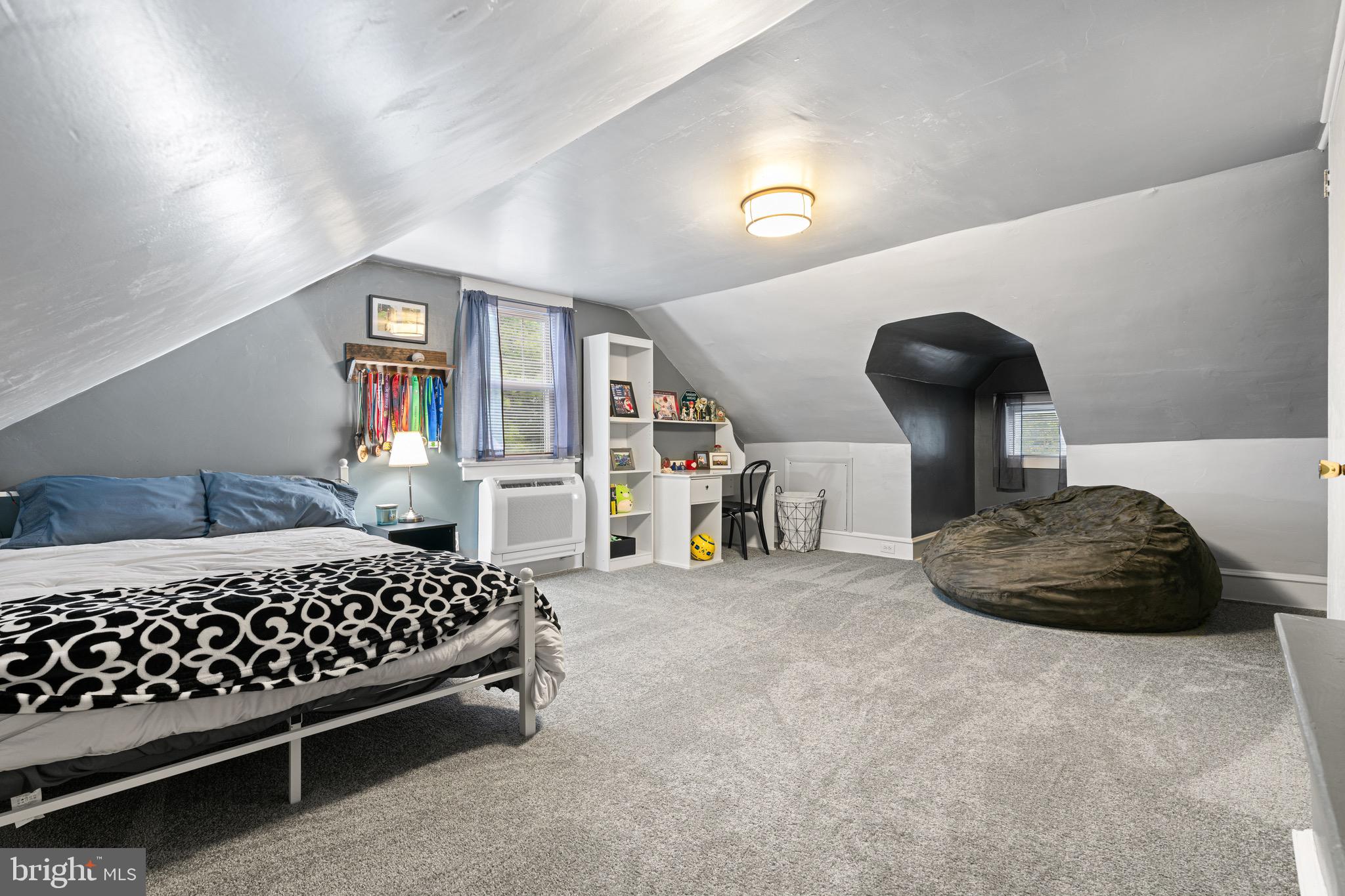 227 7th Avenue Haddon Heights, NJ 08035 - Photo 17 of 26 a bedroom with a bed a window and dresser