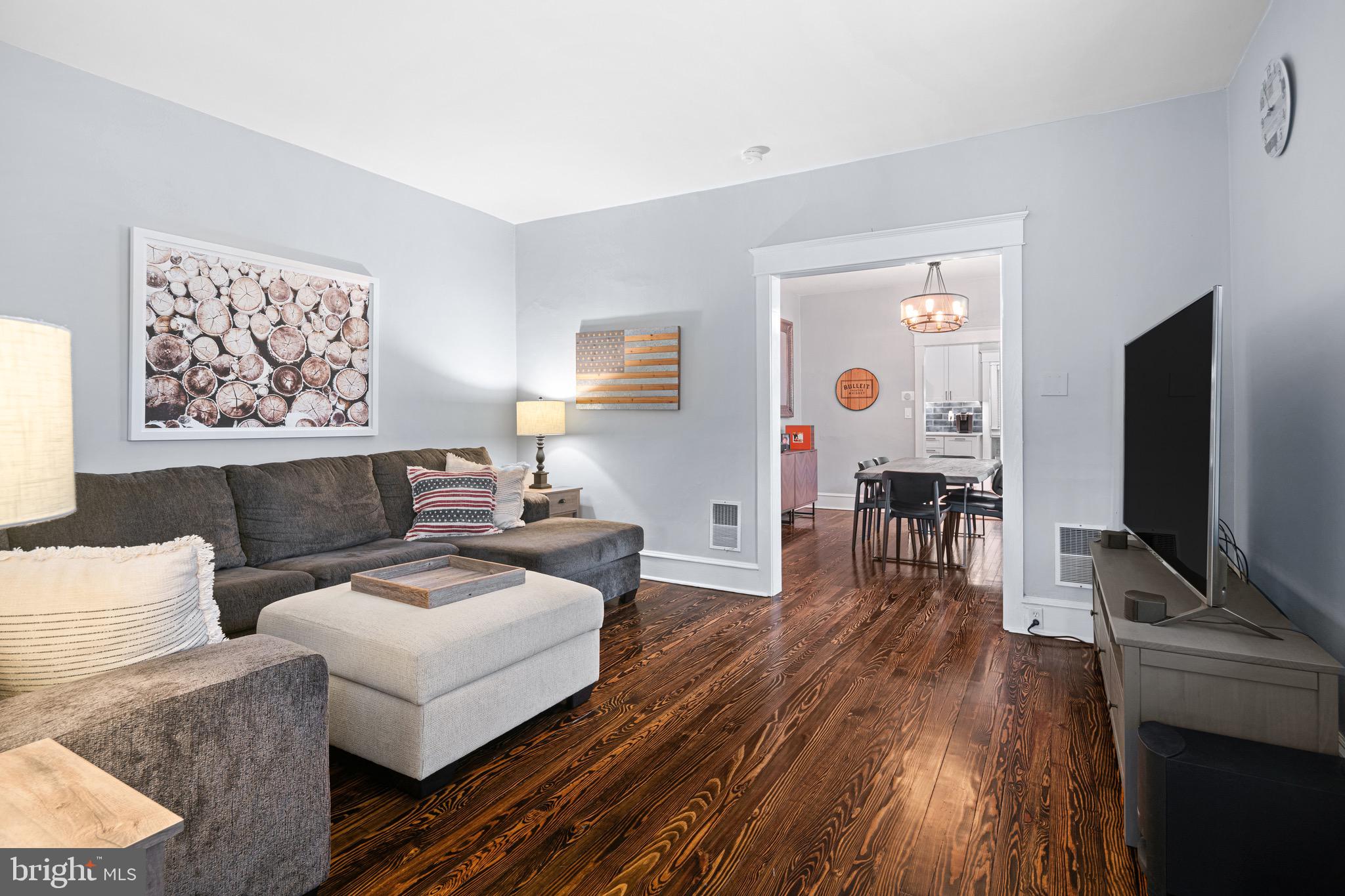 227 7th Avenue Haddon Heights, NJ 08035 - Photo 4 of 26 a living room with furniture and a flat screen tv