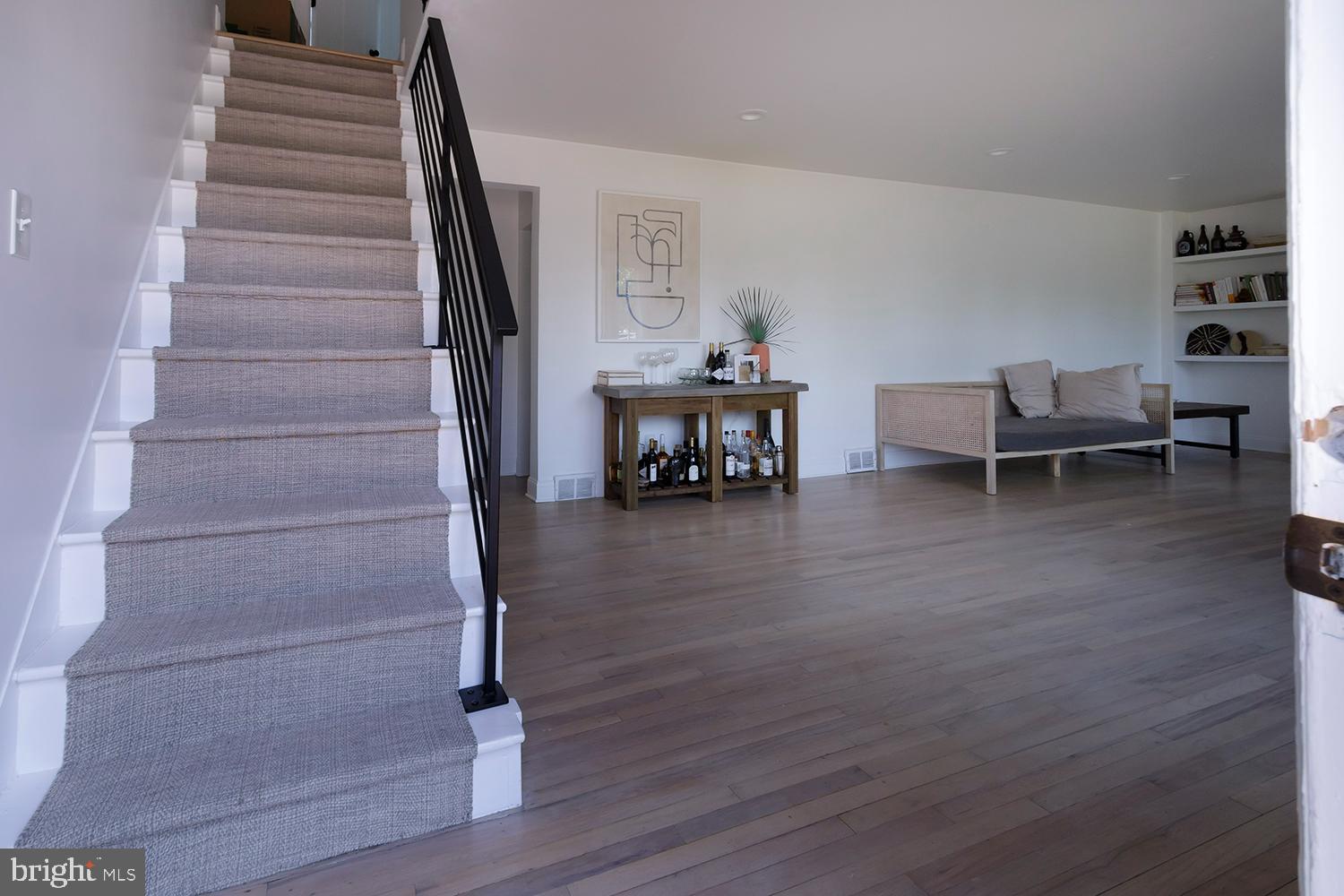 814 Jackson Road Mullica Hill, NJ 08062 - Photo 5 of 25 Entry into living room with hardwood flooring