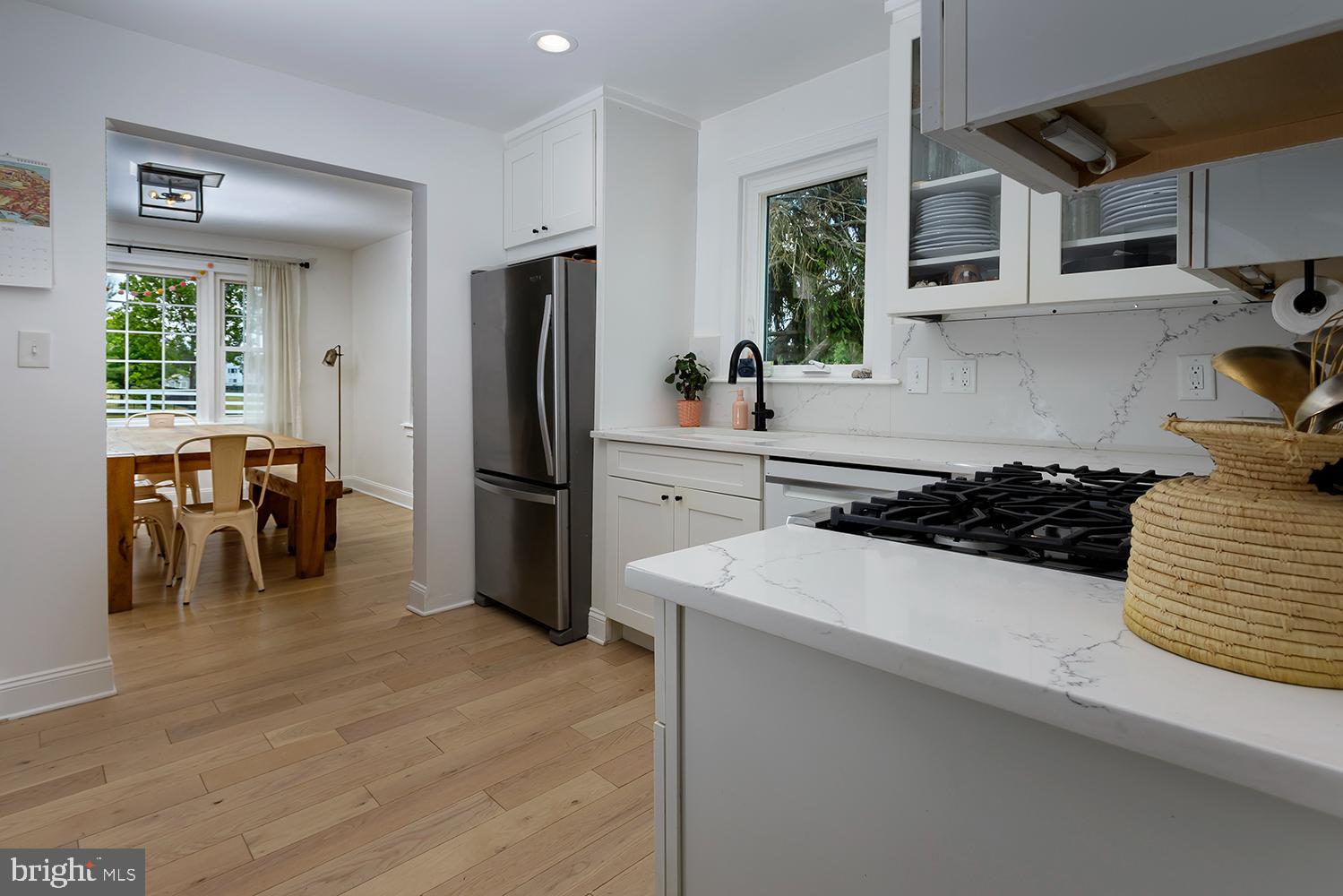 814 Jackson Road Mullica Hill, NJ 08062 - Photo 10 of 25 Hardwood flooring, open to the dining room