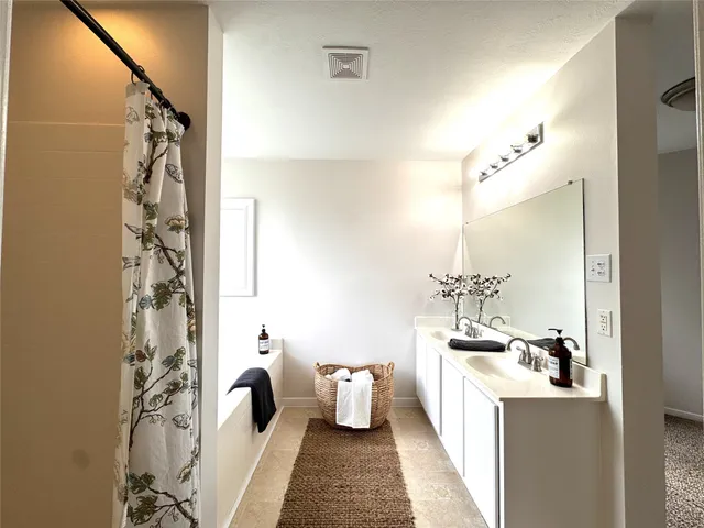 a room with a table and chairs