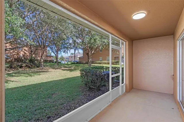 a view of a house with a yard and plants