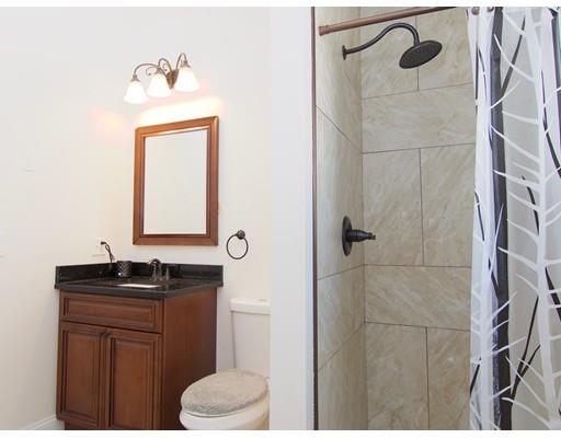 68 Alwin Place Springfield, MA 01128 - Photo 18 of 30 a bathroom with a sink toilet and shower