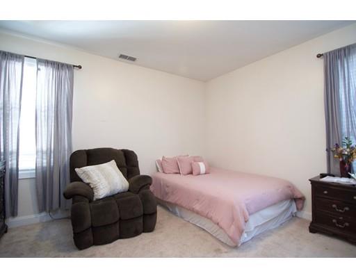 68 Alwin Place Springfield, MA 01128 - Photo 23 of 30 a bedroom with a bed and window